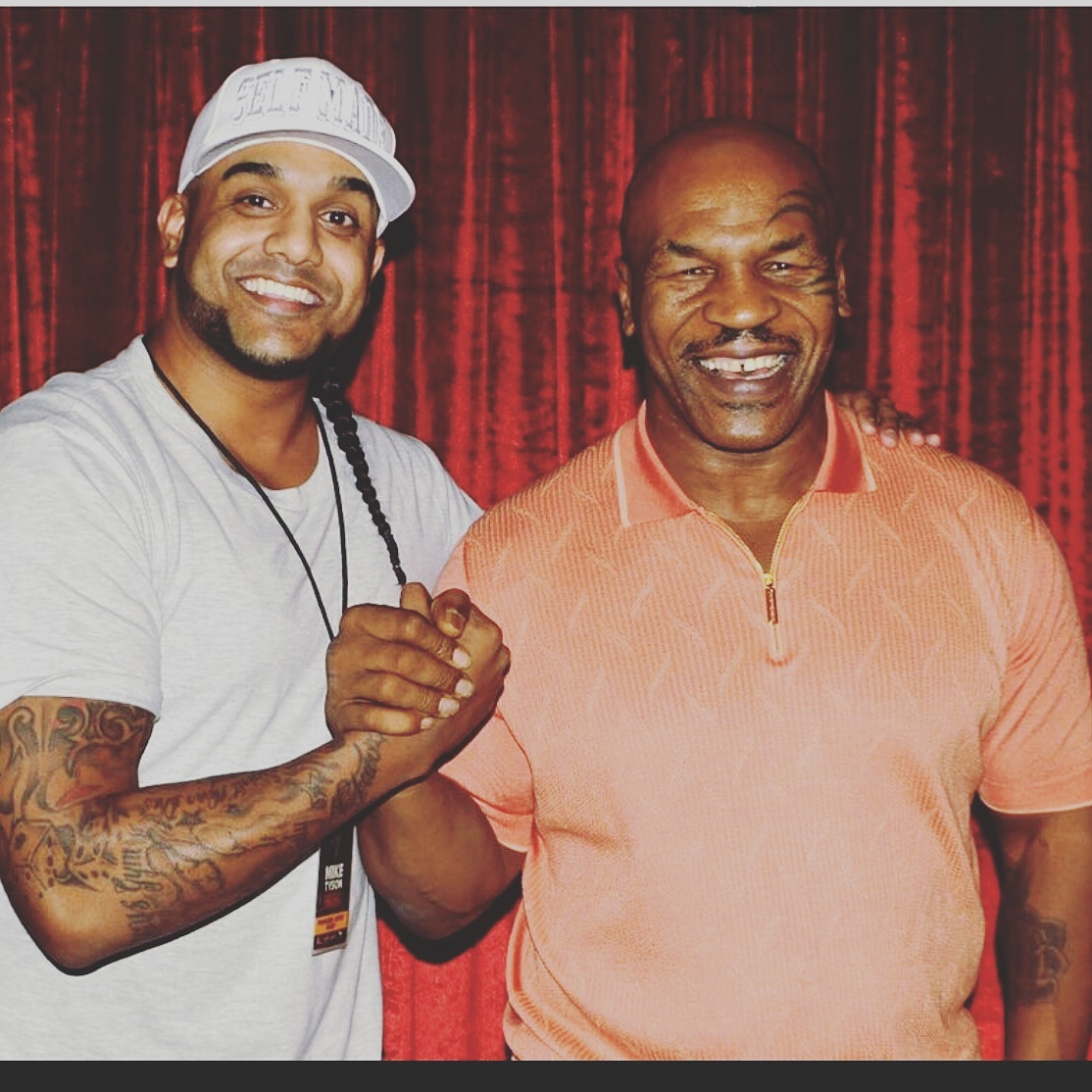 Oprichter Dayon Mungra met Mike Tyson
